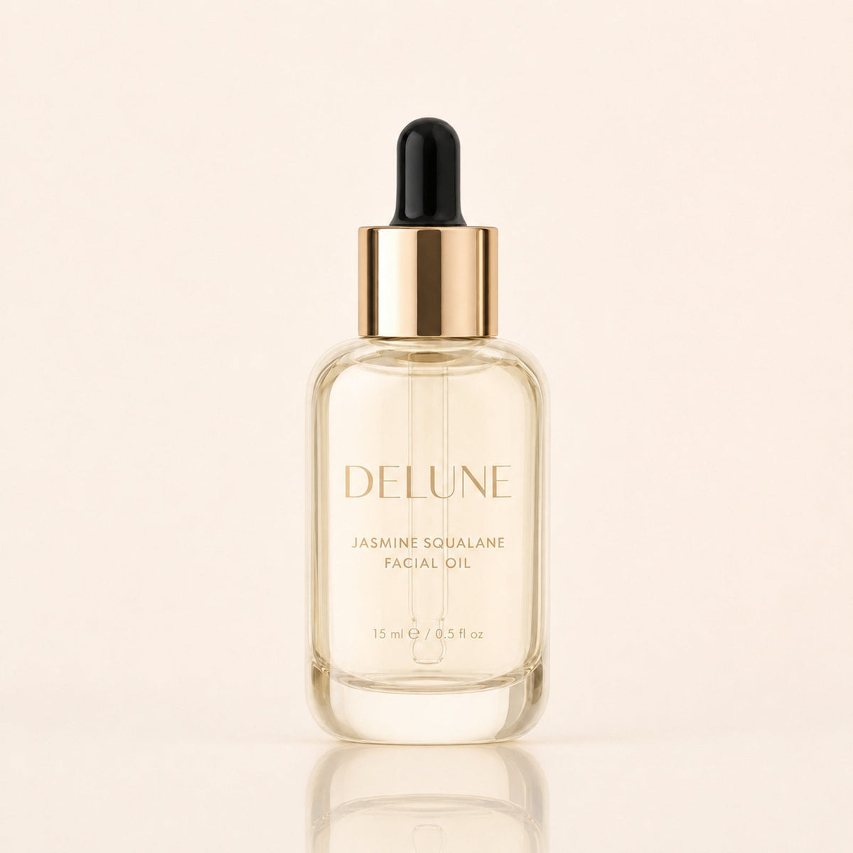 Delune Jasmine Squalane Facial Oil 15ml in pale champagne glass bottle